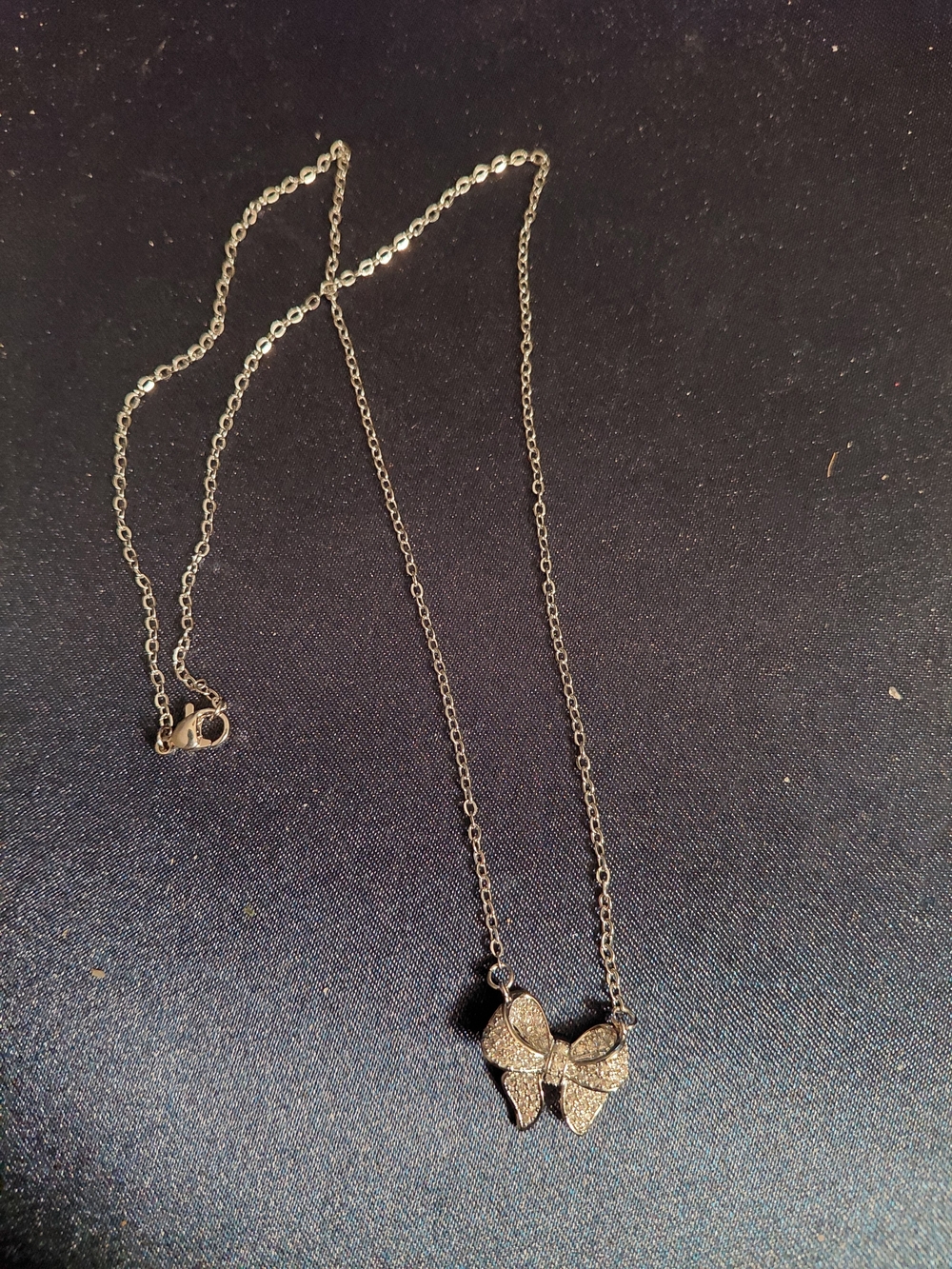 Avon Silver Bow Pendant Necklace